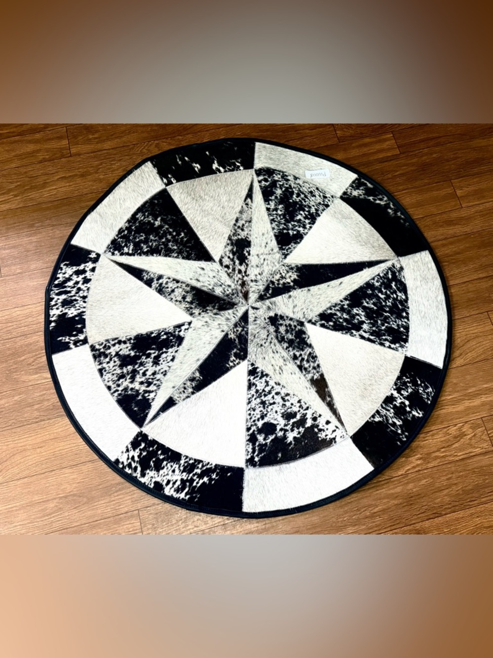Round Star Patchwork Cowhide Rug - Black & White